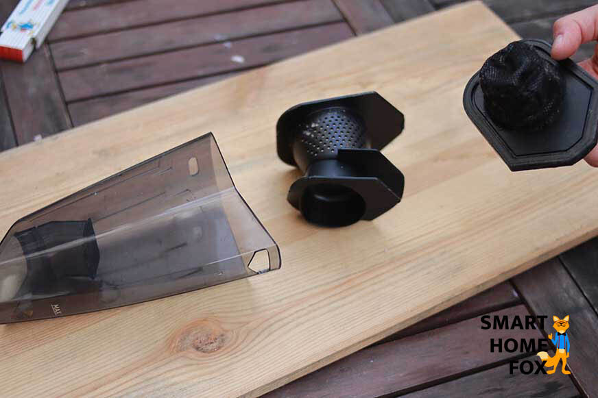 Reinigung des Schmutzbehälters